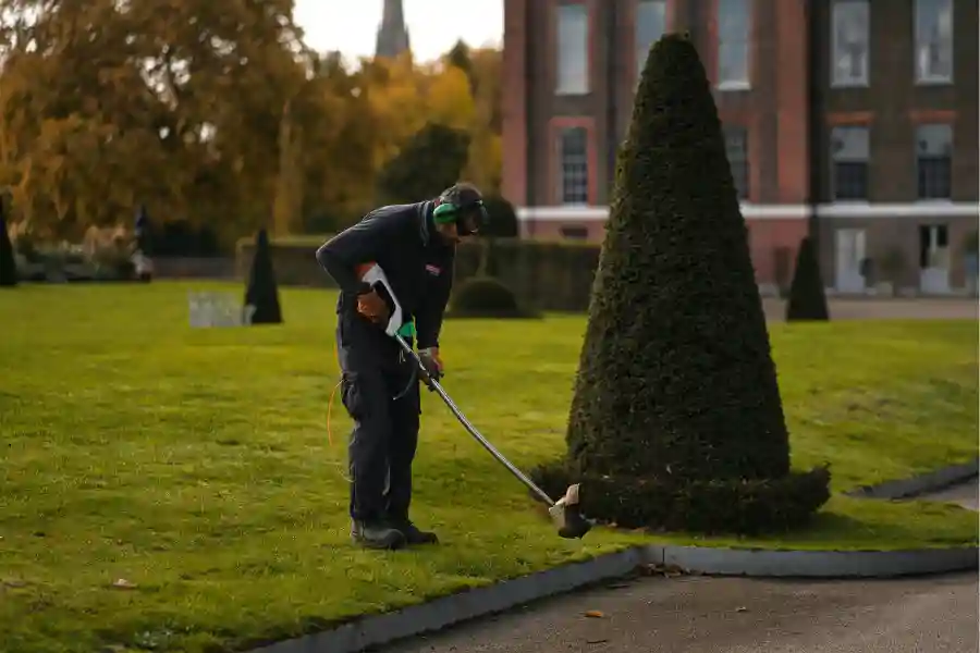 UK landscaper working on a garden project
