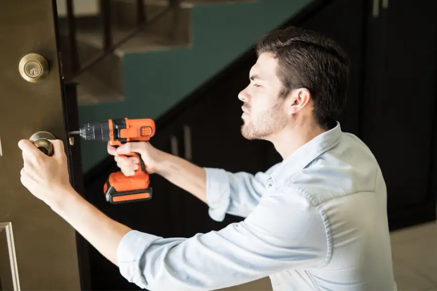 UK locksmith opening door lock on residential property