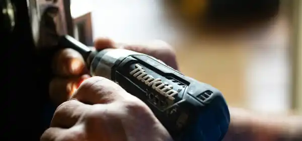 UK locksmith opening door lock during emergency callout
